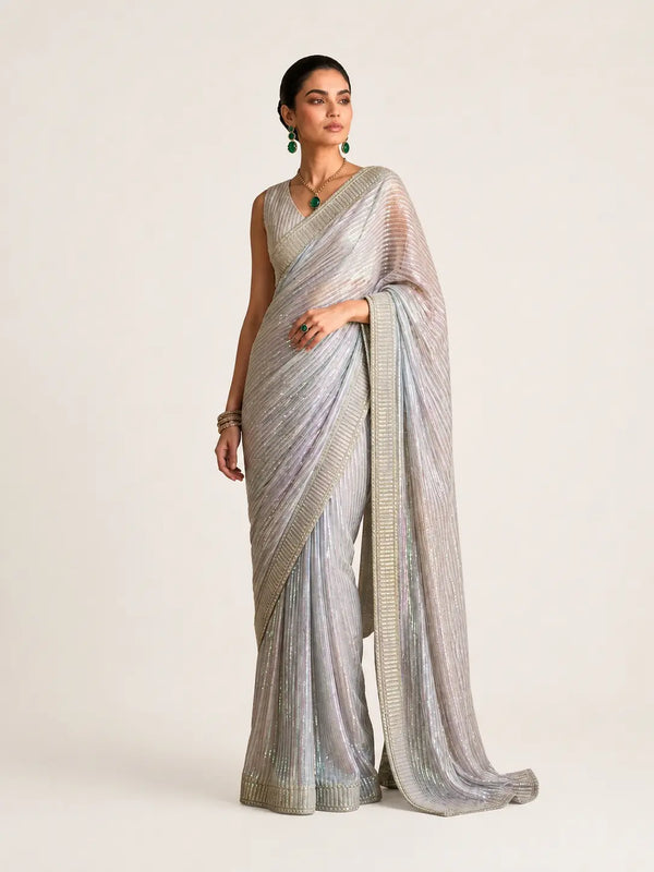 Multi Color Saree from Aik Atelier brand with beige background.